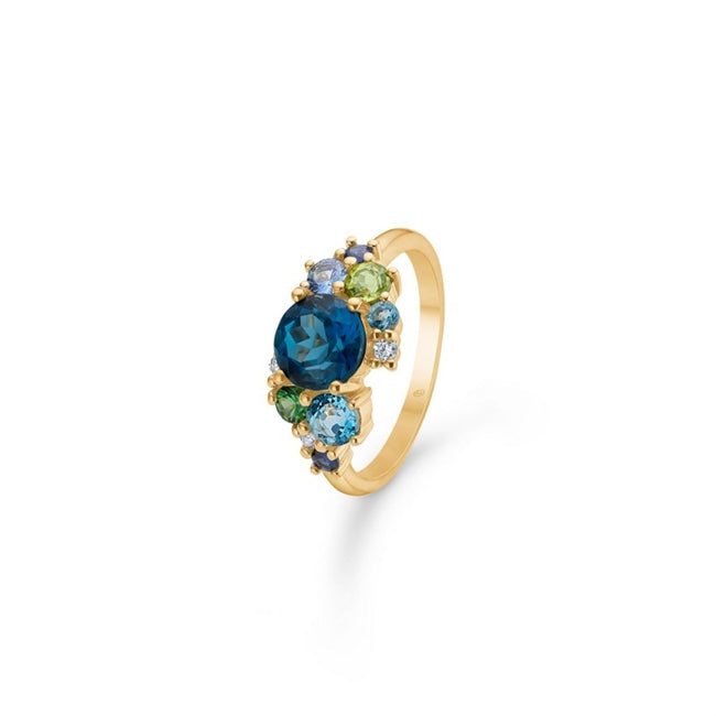 Four Seasons Winter ring i 14 kt guld med blå ædelstene og 0,06 ct diamanter fra Mads Z